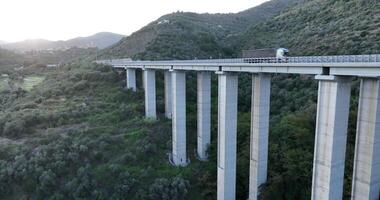 Aerial view on highway bridge in the Italian mountains video