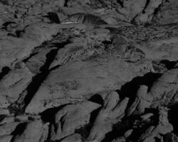 Rocks and stones close view black and white photo background