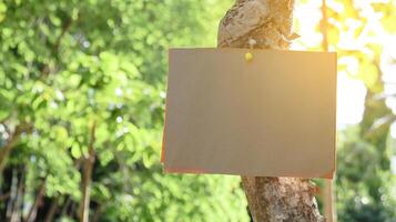 The image shows a plain paper sign, entirely blank and ready for any text photo