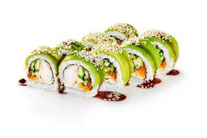 Avocado rolls with crab meat, masago, cucumbers, cream cheese, sesame and unagi sauce photo