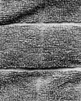 Abstract fabrics black and white background. Textile decoration close view photo