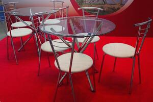 Tables, chairs and red carpet in the modern buffet photo
