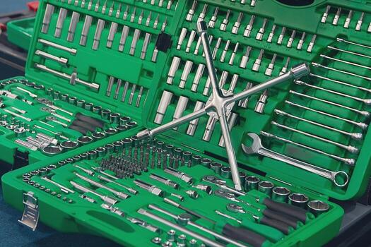 Tools and toolbox on the shop showcase. Many wrench and nuts in toolkit sets photo