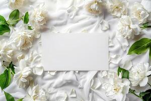 Blank Paper Surrounded by Colorful Flowers. photo