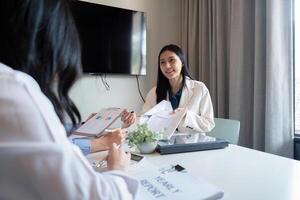 Business meeting to analyze and discuss the situation on the financial report in the meeting room. Investment Consultant, Financial advisor and accounting concept photo