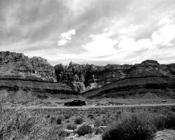 Mountains black and white photo background. High mount, rocks and hills landscape