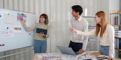 Creative UX Developer and UI Designer Brainstorming Session in Modern Office Environment photo