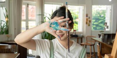Talented Artist Painting in Bright Workshop with Natural Light and Creative Atmosphere, Showcasing Artistic Process and Inspiration in a Modern Studio Setting photo