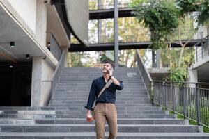 Businessman Walking with Reusable Eco-Friendly Cup, Promoting Sustainable Lifestyle and Environmental Awareness in Modern Urban Setting photo