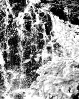 Waterfall and the mountain river background. Waterscape natural environment black and white photo background