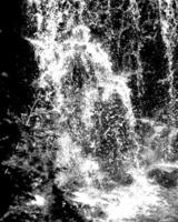 Waterfall and the mountain river background. Waterscape natural environment black and white photo background