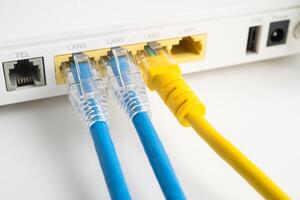 Ethernet cable with wireless router connect to internet service provider internet network. photo