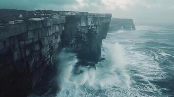 Waves Crashing Against Rugged Coastal Cliffs photo