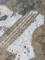 wheel track on cement floor photo