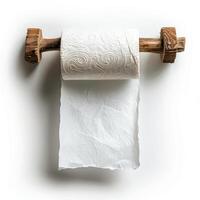Rustic wooden toilet paper holder with a roll of toilet paper on a white background. photo