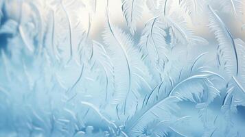 Close-up of frost patterns on winter window photo