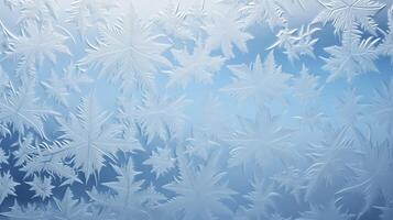 Close-up of frost patterns on winter window photo