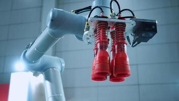 Robot arm Automation technology. Tools for saving energy effort and making the work of engineers more convenient in modern factories. Automation factory tech concept with robotic arms lifting goods. photo