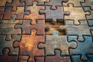 Puzzle pieces with missing pieces missing from them on a wooden surface photo