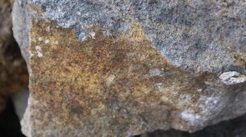 close up texture of rock fragments and soil as background photo