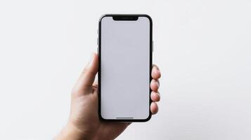 Man hand holding the smartphone with a blank screen isolated on a white background. Device mockup, mobile mockup concept. photo