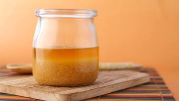 homemade ghee in container on a table , video