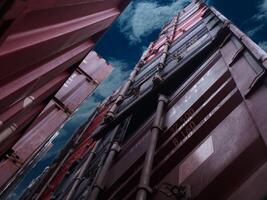 Container cargo top view blue sky background copy space logistic import export shipping transportation freight warehouse port commercial storage delivery loading global harbor stack business terminal photo