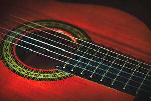 Detail of nylon strings of a classical guitar photo