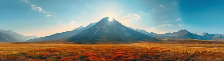 Sunlit Mountain Range in Early Morning Light photo