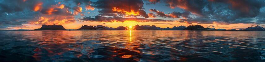 Serene Sunset Over Mountains and Calm Water photo