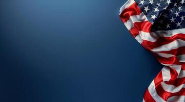 American Flag Draped Over Blue Background photo