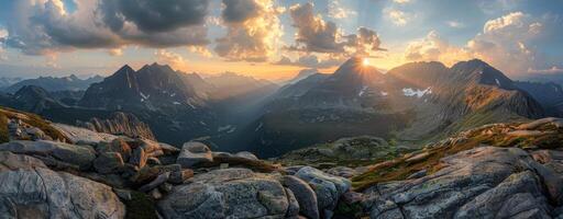 Majestic Mountain Range at Sunset With Golden Clouds photo