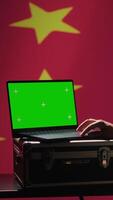 Vertical Chinese air defense using radar system on green screen laptop to detect intercontinental ballistic missiles. Republic of China army soldier scanning rockets with mockup notebook, camera A video