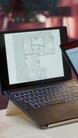 Vertical Corporate owner drafting architectural sketches for a new office, looking to relocate startup headquarters. Collaborating with contractors to design a functional and creative workspace. Camera A. video