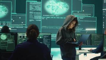 Hackers group failing to hack a system in high tech agency office, reading critical error message on big screen. Specialists trying to steal important database information from rival states. Camera A. video