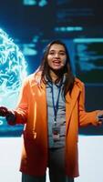 Vertical Tech specialists discussing during keynote summit presentation, exploring successful implementation of AI in driving forward businesses, sharing latest artificial intelligence innovations, camera A video