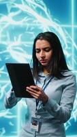 Vertical Developer using tablet to implement artificial intelligence parallel processing, breaking up complex computational tasks enabling AI systems to process more input data faster, camera A video