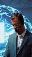 Vertical Speaker talking with audience during remote call online AI webinar hosting leading experts and researchers exploring latest insights in artificial intelligence technology, camera B video