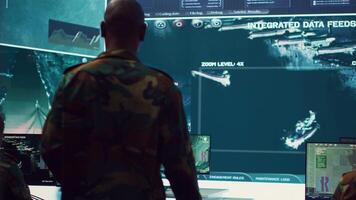 General headquarters under ruling of army IT professional that reviews insight about a new national safety mission. Command sergeant major briefing his marine corps troops with big data. Camera A. video