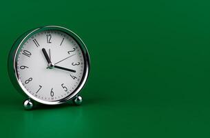 Stopping alarm clock, time concept and working with time and planning work with limited time photo