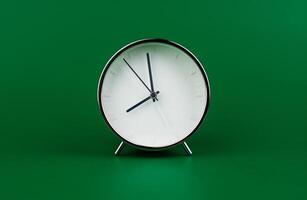 Stopping alarm clock, time concept and working with time and planning work with limited time photo