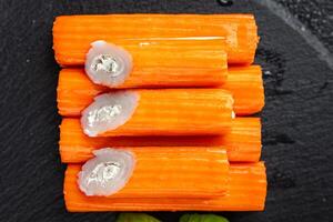 crab stick stuffing cream cheese and herbs natural fresh appetizer meal food snack on the table copy space food background rustic top view photo