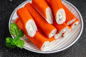 crab stick stuffing cream cheese and herbs natural fresh appetizer meal food snack on the table copy space food background rustic top view photo