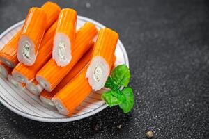 crab stick stuffing cream cheese and herbs natural fresh appetizer meal food snack on the table copy space food background rustic top view photo