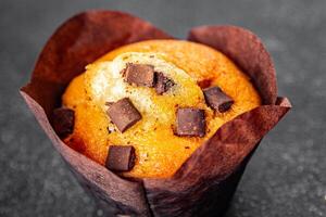 muffin chocolate cupcake sweet dessert cake appetizer meal food snack on the table copy space food background rustic top view photo