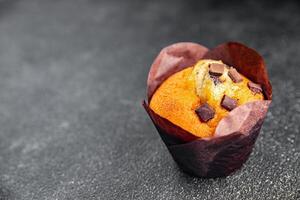 muffin chocolate cupcake sweet dessert cake appetizer meal food snack on the table copy space food background rustic top view photo