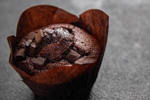 muffin chocolate cupcake sweet dessert cake appetizer meal food snack on the table copy space food background rustic top view photo