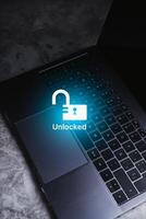 Desktop photo of laptop with futuristic interface of unlock protection. Creativity concept. Business innovation, data security and technology concept.