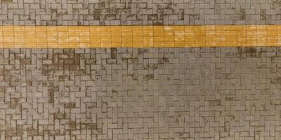 top view of the surface of wet paving slabs and pedestrian footpath after rain photo
