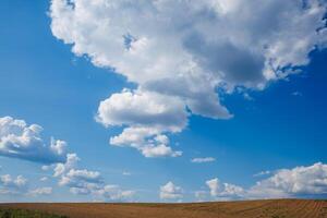 blue sky background with white striped clouds in heaven and infinity may use for sky replacement photo